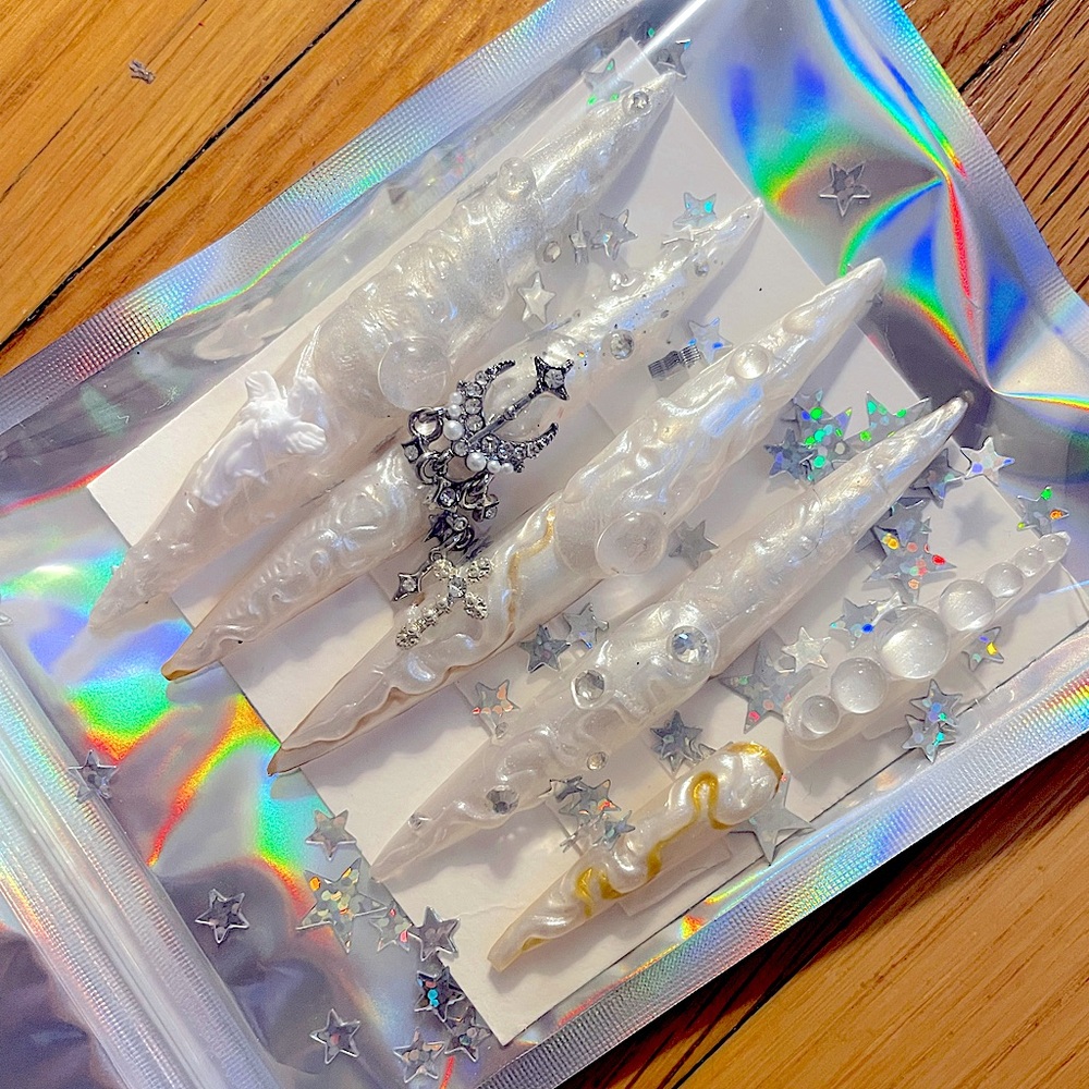 Angel of galaxies stiletto point tip gel press on nails 
In size medium/small